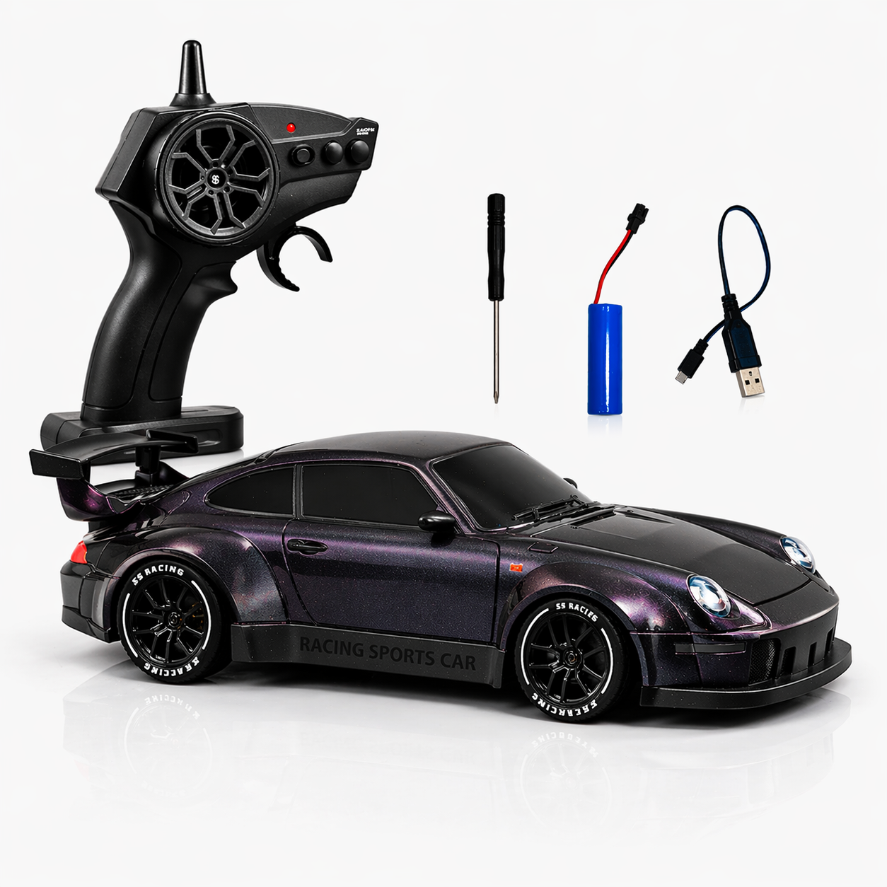 Black remote control car with accessories on a white background
